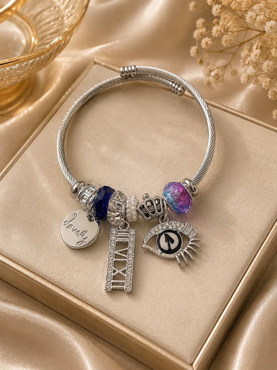 Luxury Charm Bracelet – Silver Evil Eye & Crown Charm Bangle