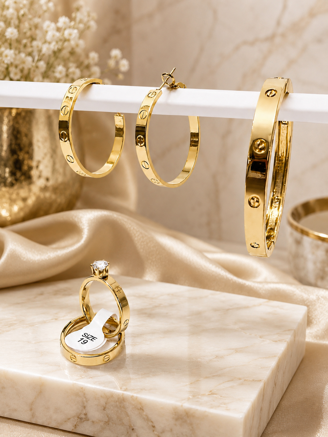 Luxury Gold 4-Piece Jewelry Set – Hoop Earrings, Bracelet Cuff & Double Rings